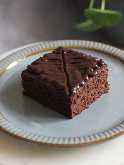 A close-up of a perfectly fudgy brownie slice. Learn to make brownies that are guaranteed to be a bestseller.