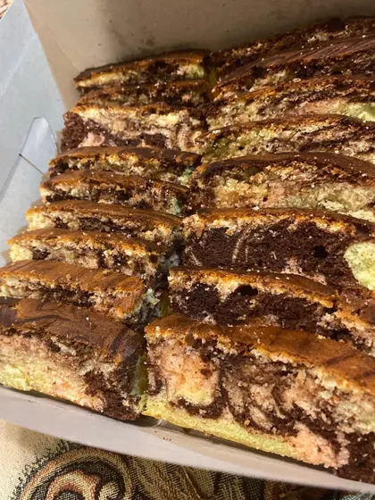 Freshly sliced Ribbon Cake, showing the lovely marbled texture. It's one of my favorite cakes to bake.