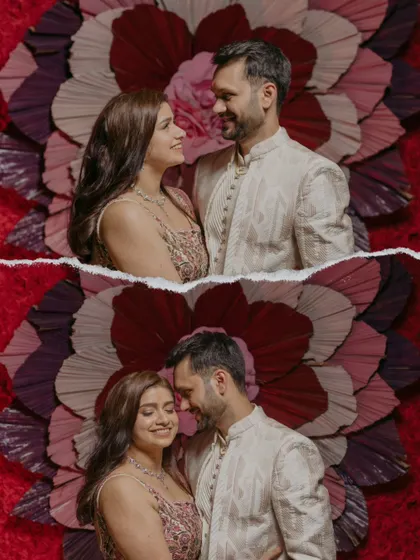 A stylish portrait of a couple against a bold, red floral backdrop. This creative composition from their roka ceremony is both modern and visually striking.