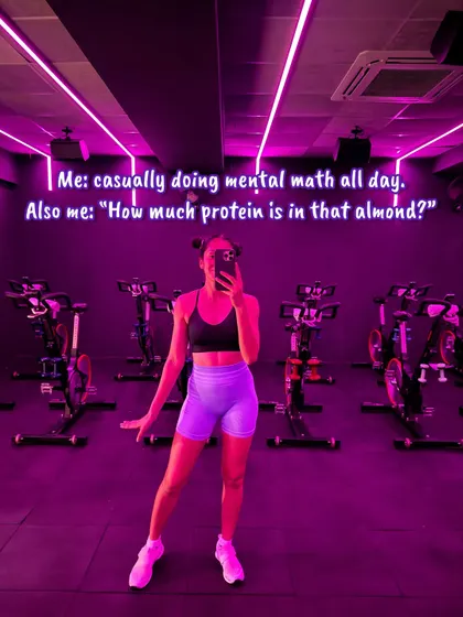 A casual mirror selfie in the spin studio. Even on days I'm doing mental math, I'm still wondering, "How much protein is in that almond?" The fitness journey is a constant learning process.