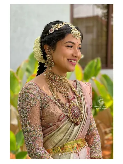 A happy, smiling Drutha on her wedding day. Capturing the joy of a bride is the ultimate goal, and the makeup is there to make her feel her most beautiful.