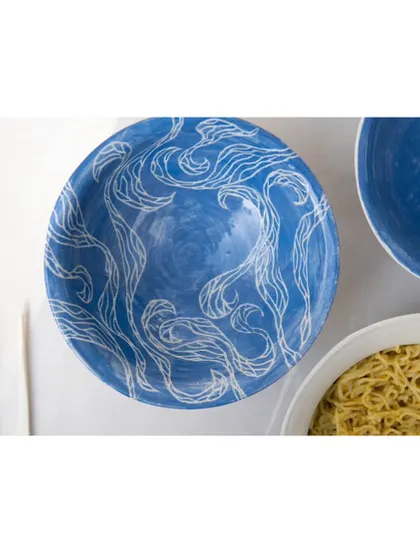 These tastefully made ramen bowls were created by our Foundation students. They are beautifully decorated with detailed sgraffito work inspired by Japanese patterns, landscapes, and culture, turning a functional item into a piece of art.