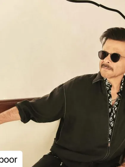 A close-up of Anil Kapoor's signature look. The volume and texture are key to this polished and dapper hairstyle.
