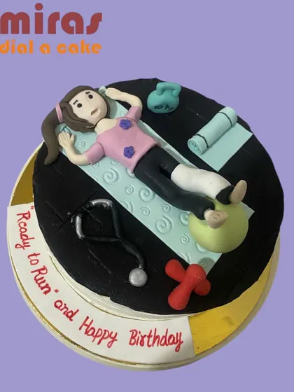 A cake that celebrates strength and recovery. This design is for a fitness enthusiast on the mend, featuring a figurine with a cast, a yoga mat, and a stethoscope, with the encouraging message "Ready to Run."