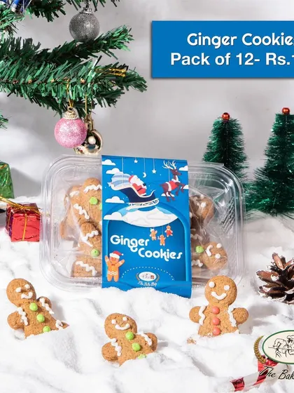 A box of our Gingerbread Cookies, perfect for gifting. These adorable gingerbread men are sure to bring a smile to anyone's face during the holiday season.