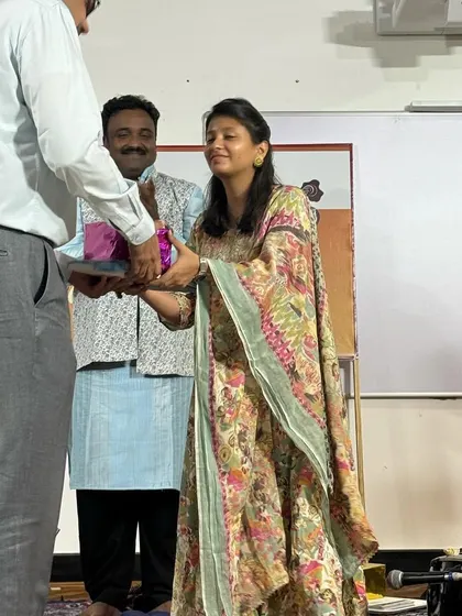My student and I being honored after our duet performance at the Sri Shankara Cancer Foundation. It was a deeply fulfilling experience for both of us.
