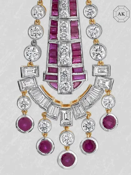 A detailed close-up of the cascading ruby and diamond earrings, showing the precision in every setting.