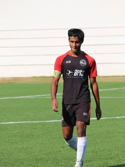 Our player Samanyu Nag, a formidable talent, walking onto the pitch as captain. He has progressed through our system to play in the A Division, showcasing the pathway I provide for dedicated players.