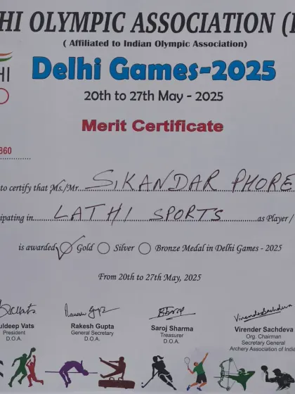 Talk is cheap. This is my Gold Medal in Lathi Sports from the Delhi Games. I don't just teach, I have competed and won at the highest level.