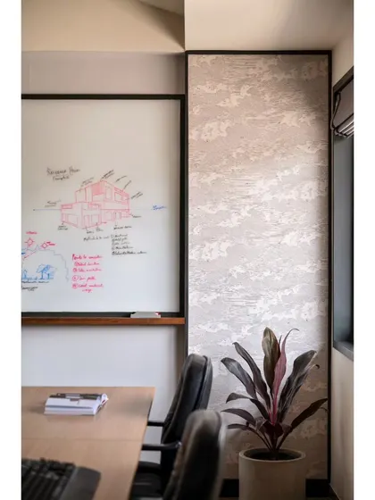 These images provide further views and details of the Project Rooftop and Noir Oak offices. They showcase everything from conference room details and corridor views to custom furniture and the play of natural light, illustrating my comprehensive approach to workspace design.