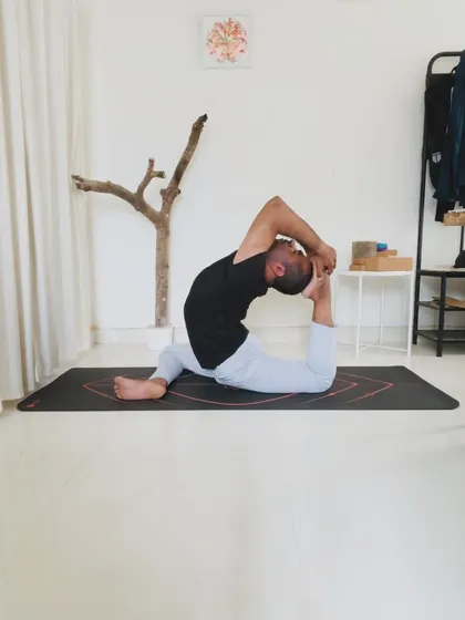 The journey into Eka Pada Raja Kapotasana (One-Legged King Pigeon Pose) is a graceful unfolding in three stages. This final expression is a culmination of a stable base, an open chest, and a deep connection between breath, spine, and grip.