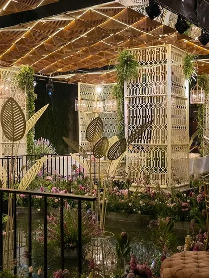 For this Mehendi sundowner, we built a custom alfresco floating island in a lotus pond. As the sun set, the illuminated ceiling and surrounding fresh flowers created a truly magical atmosphere for the celebration.
