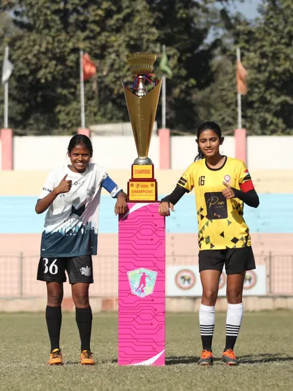 The calm before the storm. The captains of The Dream Team and Goodwill FC stand with the championship trophy, ready to battle it out in the DSA Women's Championship final.