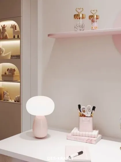 A close-up of the desk accessories and the beautifully lit display nooks, showing our attention to even the smallest details in creating a functional and inspiring space.