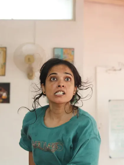 An actor makes a face during a "Gretel" rehearsal.