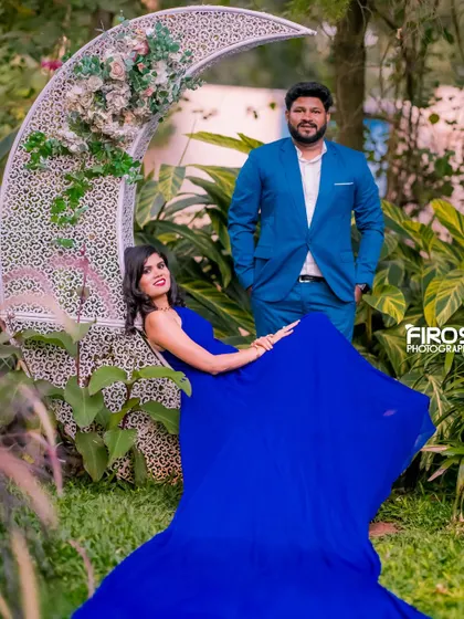 A stylish portrait with a crescent moon prop in the garden, perfect for a unique and dreamy shoot.