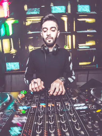 A creative shot showing my focus while mixing. The caption "do what you love, and love what you do" is my motto. I bring this passion to every event.