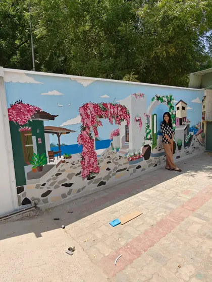 The complete view of the mural from an angle, demonstrating its impressive scale and impact on the space.