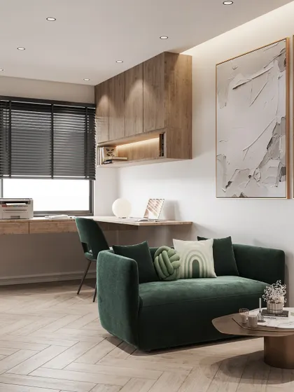 A detailed view of the home office area within the modern bedroom, complete with a desk, shelving, and a small sofa, showing how a compact space can be highly functional.