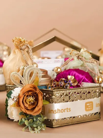 A stunning metal basket hamper curated for Inshorts, one of our long-term clients. The intricate design and floral decoration make it a standout luxury gift for Diwali.