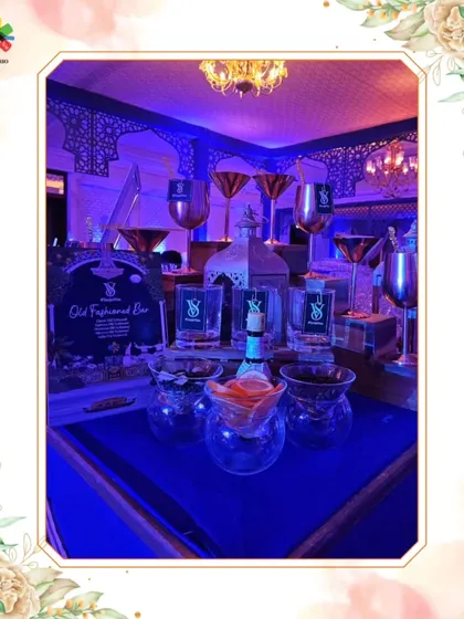 An "Old Fashioned Bar" setup with a moody, blue ambiance. The display features classic glassware and elegant decor, creating a sophisticated corner for whisky lovers.