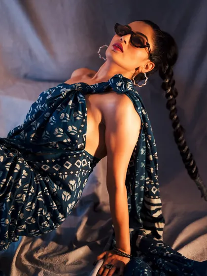 A dynamic pose that shows off the texture and movement of the fabric. This kind of shot is perfect for a fashion story that's all about attitude.