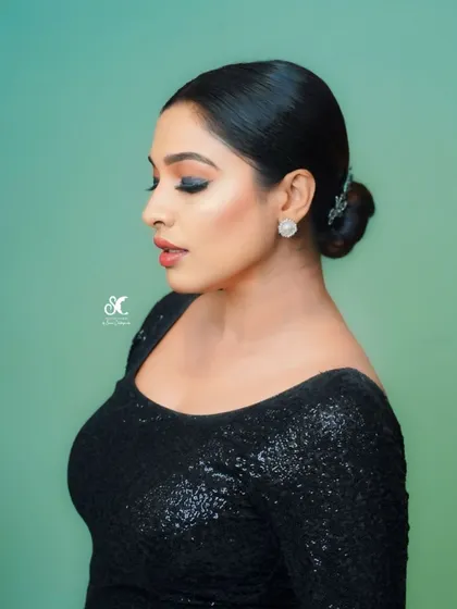 A close-up beauty shot from the same series, highlighting the flawless makeup and elegant hairstyle.
