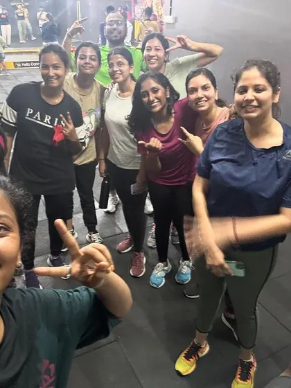 The peace sign says it all. Feeling accomplished and happy after a tough workout.