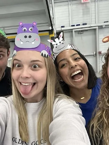 Silly faces and animal hats are a must for Jungle Safari week. Our coaches know how to make every moment fun.