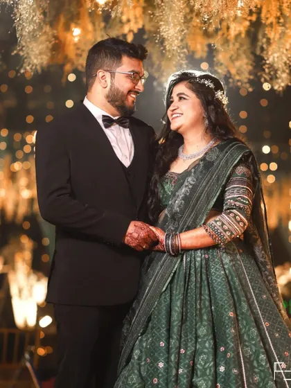 The look of love. This portrait of Nidhi and Himanshu is all about the shared glance and gentle smiles. It’s a perfect example of a natural, comfortable portrait amidst the wedding festivities.