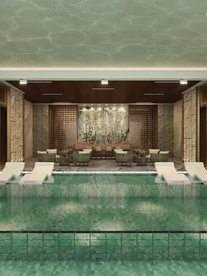 Another view of the Ceejay Residency pool, where you can unwind in style, surrounded by calming landscapes that echo the grandeur of natural beauty. The design celebrates the fusion of natural repose with architectural brilliance.