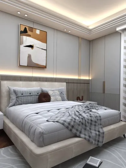 A contemporary bedroom design where I used a mix of textures, including wall fluting and a plush area rug. The abstract artwork adds a splash of color, and the hanging pendant lights serve as stylish bedside lamps.