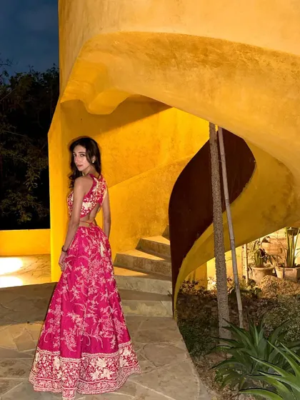 A vibrant lehenga for a performance in Jaisalmer. We manage all logistics to be present for your events across different cities.