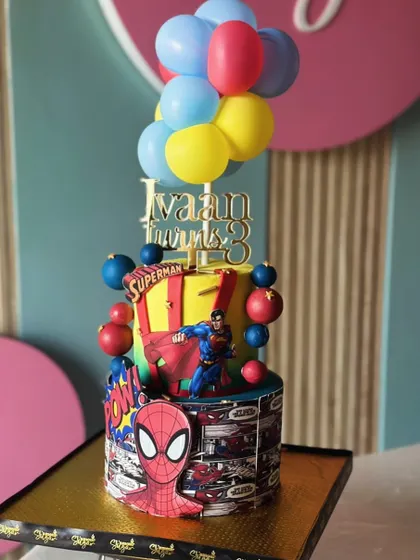 Avengers, assemble! Our superhero cakes bring the action to your party, featuring characters like Spider-Man, Superman, Batman, and the Hulk on multi-tiered cityscapes.