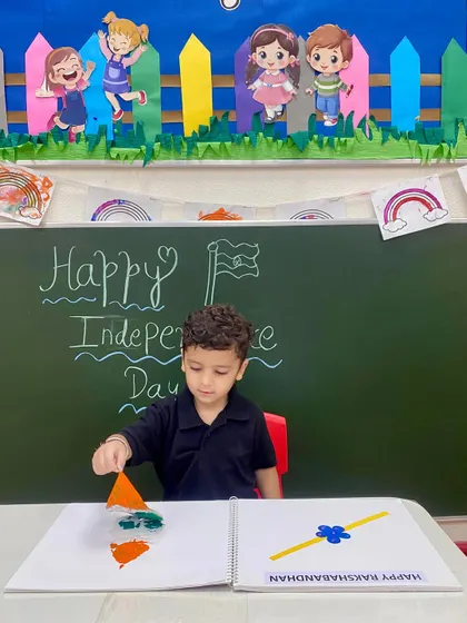 This little one is completely absorbed in his leaf printing activity. Sensory art projects like this allow children to learn through touch and sight, making the experience more memorable.