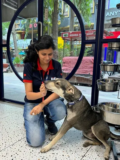 Another heartwarming photo of our team member bonding with Tyson, showcasing our commitment to every animal that comes through our doors.