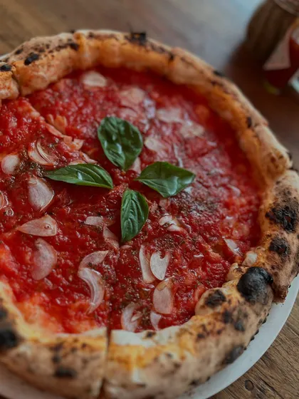 No cheese, no fuss. Just pure, saucy perfection with our Marinara pizza.