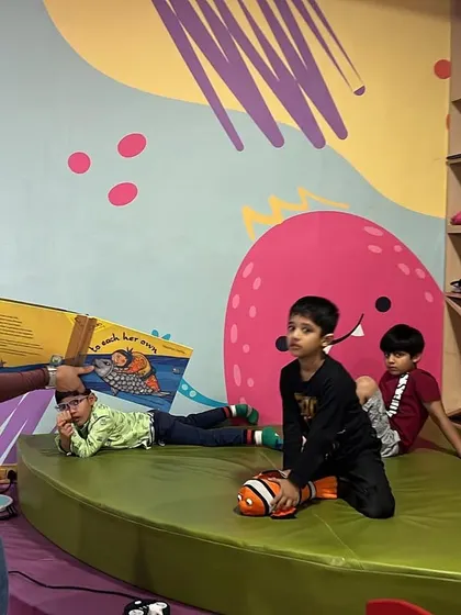 Story time is a key part of every camp. Here, campers are relaxing and listening to a story in our cozy reading area.