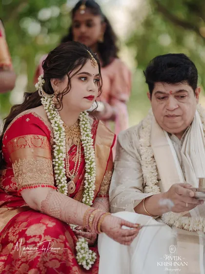 A candid moment from the wedding ceremony. We provided makeovers for the entire family, including the bride's parents, ensuring everyone looked coordinated and felt their best.
