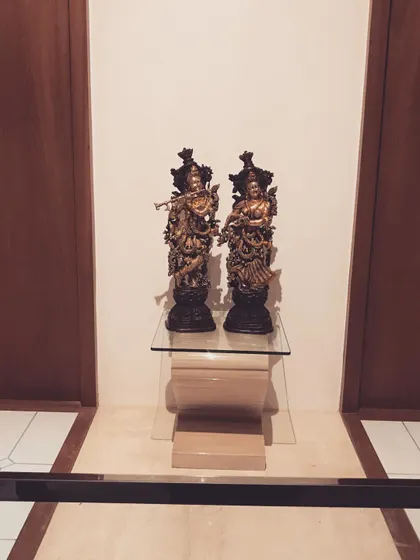 A closer view of the displayed statues, showing their intricate craftsmanship.
