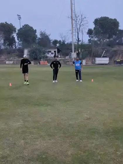 A moment of rest and strategy discussion during a field session. It's important to combine physical work with tactical understanding to become a smarter, more effective athlete.