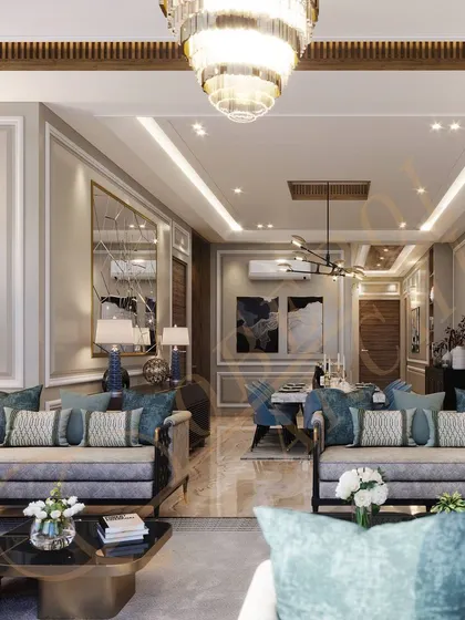 This apartment living room uses clever furniture placement and a cohesive color scheme to create a sense of grandeur and space.