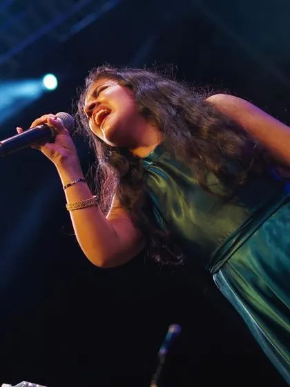Lost in the music during a vocal improvisation at our Pune concert. These are the moments of pure bhakti and musical expression that I cherish.