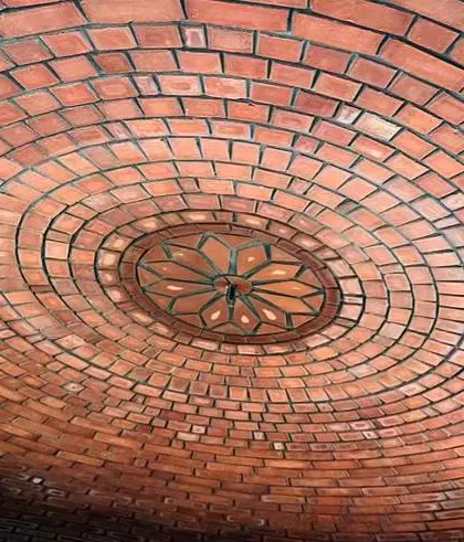 This dome features a decorative floral pattern at its center, showcasing an even higher level of brick craftsmanship.