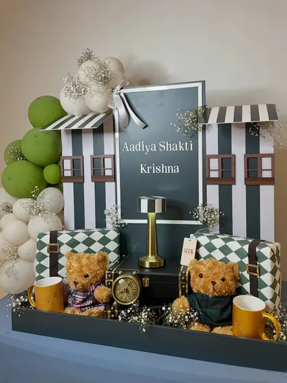 A full view of the elegant green and white themed hamper for Aadiya and Krishna.