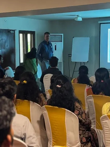 A wider shot of the CME event, showing the engaged audience of doctors. We believe that continuous education is key to maintaining the highest standards of Ayurvedic practice.