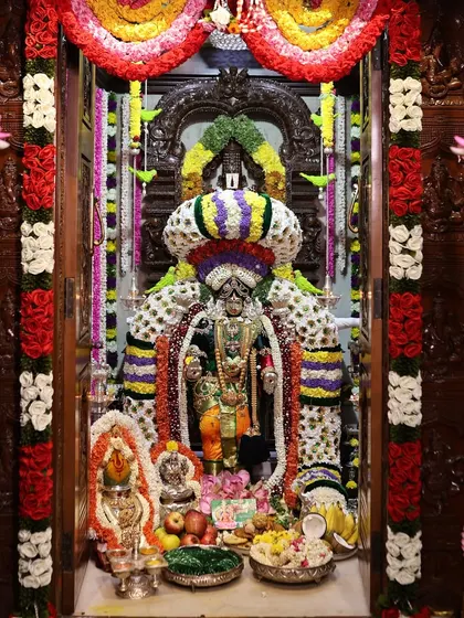 A full view of our home's pooja mantapa during the Varamahalakshmi festival. You can learn how to arrange the deities, offerings, and decorations to create a complete and sacred space.