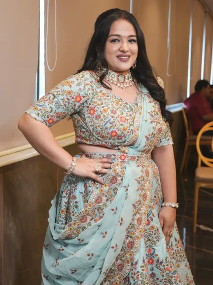 Another great shot of the client in her floral rental lehenga, showing how it can be styled for any body type.