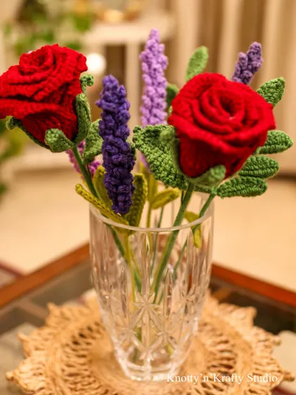 Red roses and lavenders. Of all my flower arrangements, this one is my favourite. I just love the way the red and shades of purple bring out the best in each other.