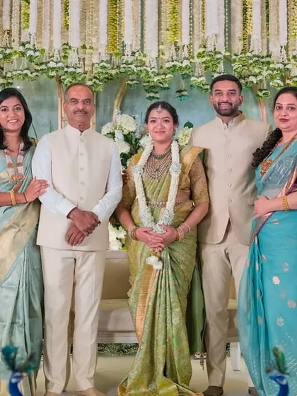 A beautiful family portrait. I had the pleasure of designing blouses for the mom-to-be and her sister, ensuring they both looked radiant for the baby shower.